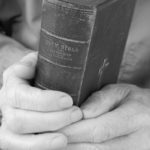 Older Man Holding Bible